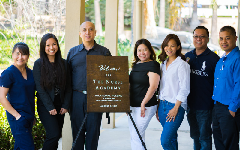 Faculty and staff posing for a photo at The Nurse Academy orientation in 2019