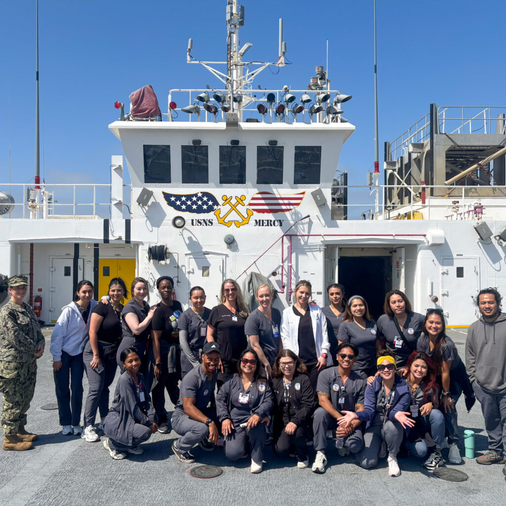 Students and staff aboard the USNS Mercy hospital ship in 2025